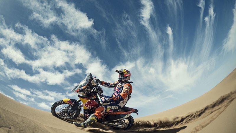 Motorcycle adventure tour through the Sahara Desert dunes